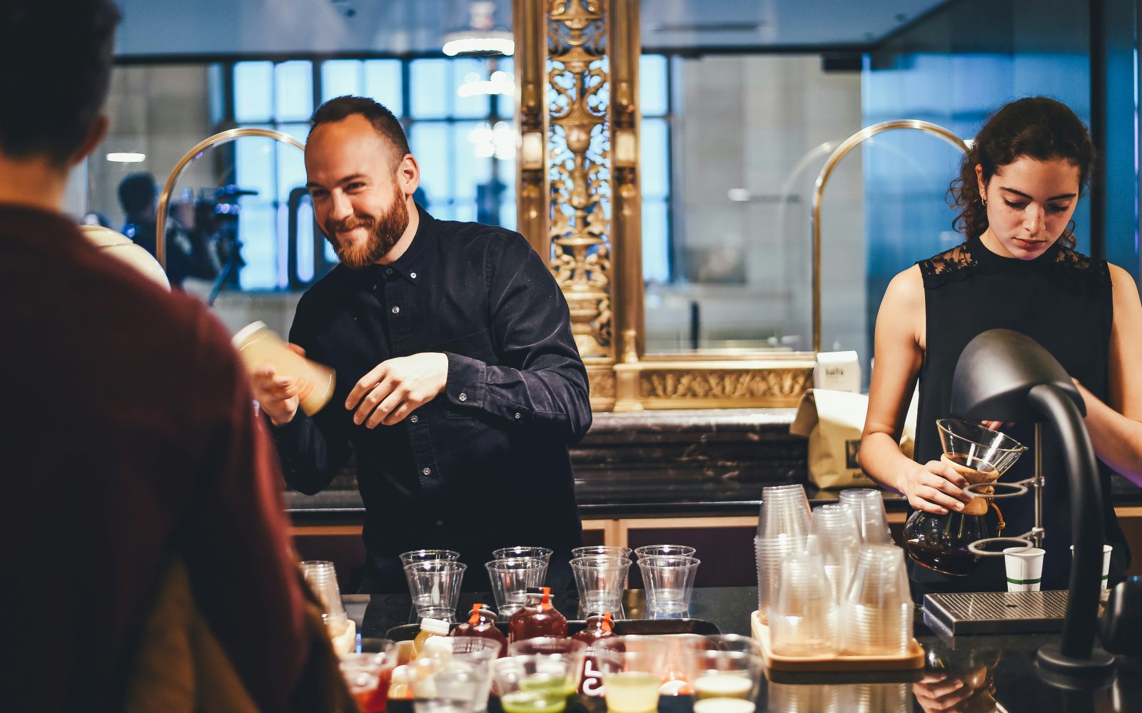 Bar staff mid-service